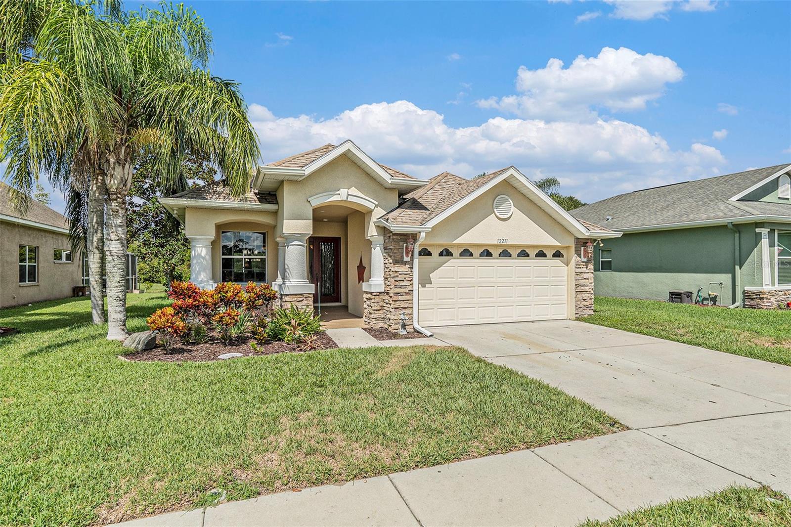 Welcome to 12231 Oak Ramble Drive, a beautifully maintained home in the heart of Spring Hill that combines comfort, style, and a serene setting. This property boasts an abundance of natural light, an open floor plan, and elevated ceilings that create a bright and airy atmosphere. Elegant touches such as engineered hardwood flooring and crown molding add warmth and sophistication throughout.
The open-concept kitchen features updated appliances, a spacious dining area, and plenty of storage—perfect for both everyday living and entertaining. Each of the large bedrooms offers oversized closets, providing ample space and convenience.
Step outside to the screened-in patio, where you can relax in your private jacuzzi while enjoying tranquil views of the pond just beyond your backyard. This home offers the perfect blend of indoor comfort and outdoor retreat in a quiet, desirable neighborhood.
Don’t miss your chance to make this stunning property your new home!