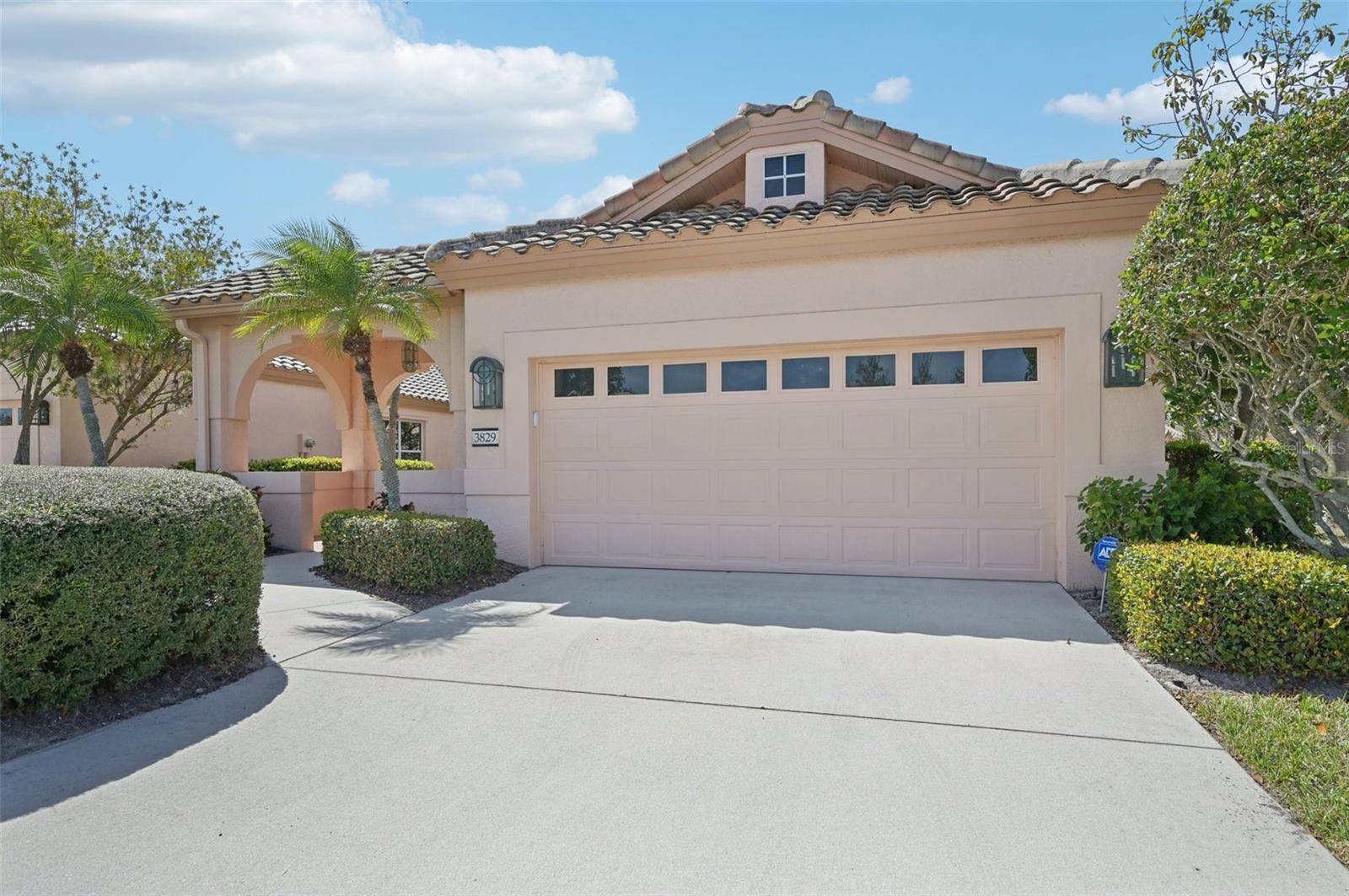 Welcome to this stunning Mediterranean-style home, perfectly situated on a spacious corner lot for added privacy and curb appeal. From the moment you enter through the charming portico entrance, you’ll feel the warmth and elegance of this thoughtfully designed home. Enjoy peace of mind with the home having been completely replumbed and equipped with a whole-house water filtration system for fresh, clean water throughout. The insulated 2-car garage adds convenience and efficiency year-round. Inside, the updated kitchen is a chef’s delight, featuring a huge eat-in area perfect for gatherings. The updated bathrooms offer a touch of modern luxury. With two spacious bedrooms and a den complete with built-in desk and bookcases, there’s plenty of space for both relaxation and productivity. A laundry room with a utility sink and extra storage adds even more convenience. Beyond the home, enjoy access to a heated community pool and spa, offering resort-style relaxation close to your door. This beautifully maintained home is ready and waiting for you to make it your own!