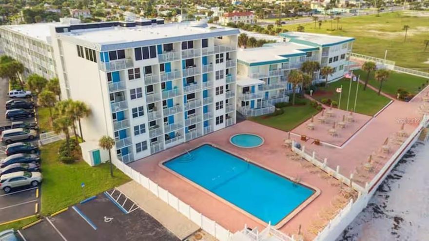 This beautifully updated studio condo in Daytona Beach offers the ideal blend of true beachfront living, strong rental potential, and effortless comfort. Whether you’re seeking a full-time residence, a profitable short-term rental, or a long-term investment opportunity, this versatile oceanfront property delivers exceptional flexibility. The unit can be lived in full time, used as a short-term rental, and self-managed—giving owners complete control and maximum income potential. Step inside to a bright, modern living space featuring an open layout filled with natural light and a warm coastal ambiance. The thoughtful design creates a seamless flow between living, dining, and sleeping areas, resulting in a space that feels both comfortable and inviting. Wake up to ocean views and the soothing sound of waves from your private retreat, then step outside and feel the sand beneath your feet—this unit is just steps from the beach, offering one of the closest beachside experiences available. Ocean Jewels Club provides a true resort-style setting with direct beach access and an impressive lineup of amenities designed to elevate everyday living. Residents and guests enjoy two oceanfront pools, a dedicated kiddie pool, sun loungers, patio seating, and BBQ grills perfect for relaxing or entertaining. Additional amenities include a fitness center, library, game room, laundry facilities, an on-site restaurant and bar, and free parking for added convenience. Ideally located near top dining, shopping, hospitals, entertainment, and iconic attractions such as the Daytona International Speedway, this property combines lifestyle and location in one exceptional package. Perfect as a serene beachside getaway or a high-demand income-producing investment, this oceanfront studio delivers unmatched value, convenience, and coastal charm. Experience the best of Daytona Beach living and make this beachfront gem your own.