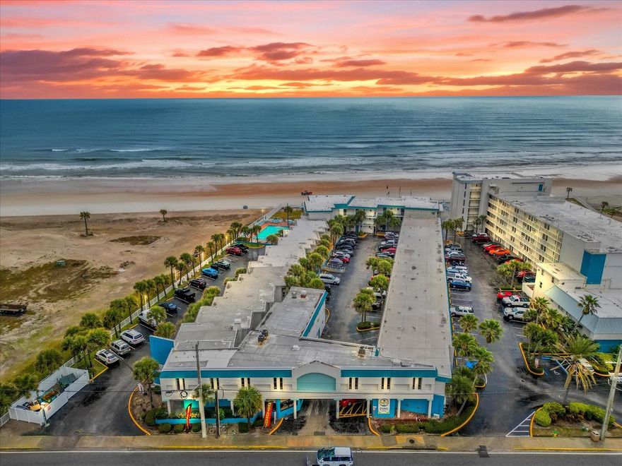 This beautifully updated studio condo in Daytona Beach offers the ideal blend of true beachfront living, strong rental potential, and effortless comfort. Whether you’re seeking a full-time residence, a profitable short-term rental, or a long-term investment opportunity, this versatile oceanfront property delivers exceptional flexibility. The unit can be lived in full time, used as a short-term rental, and self-managed—giving owners complete control and maximum income potential. Step inside to a bright, modern living space featuring an open layout filled with natural light and a warm coastal ambiance. The thoughtful design creates a seamless flow between living, dining, and sleeping areas, resulting in a space that feels both comfortable and inviting. Wake up to ocean views and the soothing sound of waves from your private retreat, then step outside and feel the sand beneath your feet—this unit is just steps from the beach, offering one of the closest beachside experiences available. Ocean Jewels Club provides a true resort-style setting with direct beach access and an impressive lineup of amenities designed to elevate everyday living. Residents and guests enjoy two oceanfront pools, a dedicated kiddie pool, sun loungers, patio seating, and BBQ grills perfect for relaxing or entertaining. Additional amenities include a fitness center, library, game room, laundry facilities, an on-site restaurant and bar, and free parking for added convenience. Ideally located near top dining, shopping, hospitals, entertainment, and iconic attractions such as the Daytona International Speedway, this property combines lifestyle and location in one exceptional package. Perfect as a serene beachside getaway or a high-demand income-producing investment, this oceanfront studio delivers unmatched value, convenience, and coastal charm. Experience the best of Daytona Beach living and make this beachfront gem your own.