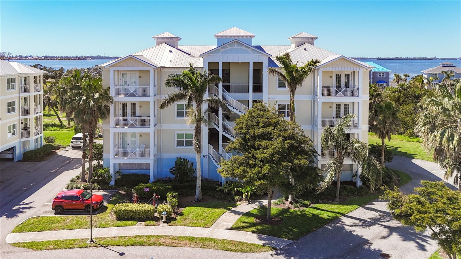 Discover the ultimate Florida lifestyle in this stunning resort-style condo in the exclusive gated community of Palma Sola Bay Club! Nestled just 10 miles from the pristine beaches of Anna Maria Island. This luxury condo offers the best of both worlds-serene nature and vibrant city life. Step into this elegant first-floor unit and take in the private balcony view of Charlotte Lake, where nature greets you every morning. The second balcony showcases a stunning preserve view with glimpses of Palma Sola Bay, making this home a peaceful retreat. Inside you will find luxury vinyl plank flooring, glass impact windows, and plantation shutters throughout, adding warmth and elegance. Freshly painted interiors give the space a modern and move-in ready appeal. A fire sprinkler has been installed in each room of the home. This feature may qualify for an additional credit on your homeowners insurance and potentially lowering your premium. The upscale kitchen features light color cabinetry, a travertine backsplash, and a sleek granite countertops, creating the perfect space for cooking and entertaining. The extra feature of USB port was installed in the kitchen for your convenience. Enjoy exclusive access to a two-story Key West style clubhouse just a short walk from your unit. The community pool, fire pit, and grilling pavilions make gatherings a breeze, while the bocce court and putting green provide endless entertainment from 8 am to 10 pm. For outdoor lovers, the observation deck and kayak launch on Palma Sola Boulevard are perfect for morning paddles. Plus, your gated storage locker and protected kayak storage make adventuring even more convenient! This condo comes with two covered parking spaces and a private storage room, all located directly underneath the building. Plus, there is an elevator that takes you right to the first floor -what a luxury comfort and easy access with a first floor location. This is a pet friendly community- two pets up to 100 lbs. are welcome. Minutes from shopping, fine dining and Florida's best beaches!
This is a perfect place to live every day like you're on vacation!
Don't wait-schedule your private tour today and make this dream condo your reality!