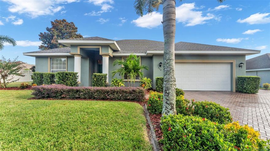 Welcome to 730 Country Cove Walk, a beautifully maintained home with curb appeal that shines. The property features a spacious yard with meticulous landscaping, accented by palm trees and vibrant colored plantings that buffer both the front and back exterior. An extended paver driveway—recently sealed—offers additional parking convenience on the right side, setting the tone for thoughtful details throughout.
Inside, this 4-bedroom, 2-bathroom residence offers a flexible and functional layout. Through the front door, the hallway leads left into a fourth bedroom currently used as an office, while to the right you’ll find a designated dining room that can easily serve as a flex space. The heart of the home is the open living area, connected seamlessly to a well-appointed kitchen with stainless steel appliances, abundant countertop and cabinet space, and a dedicated area for a coffee or wine bar. French doors extend the living space outdoors, opening to an oversized lanai with tranquil views of the spacious backyard and the retention area beyond—no immediate neighbors and a peaceful breeze make this the perfect place to relax or entertain. The primary suite is tucked to the left side of the home, offering direct lanai access, a walk-in closet, and a spa-like ensuite with an extended vanity, soaking tub, and tiled walk-in shower. Two additional bedrooms are located down the hallway from the living area alongside the guest bathroom, with one bedroom featuring a sliding pocket door that creates an ideal guest or MIL suite. This thoughtful tri-split floorplan balances privacy and flexibility—perfect for work-from-home needs, growing families, or visiting guests. Important updates and features include: water heater (2006), appliances (all original from 2006 when the home was built), and a new roof installed on 4/28/2023. Blending indoor comfort with outdoor beauty, this home is ready for its next chapter. Schedule your private showing today and fall in love with everything 730 Country Cove Walk has to offer!