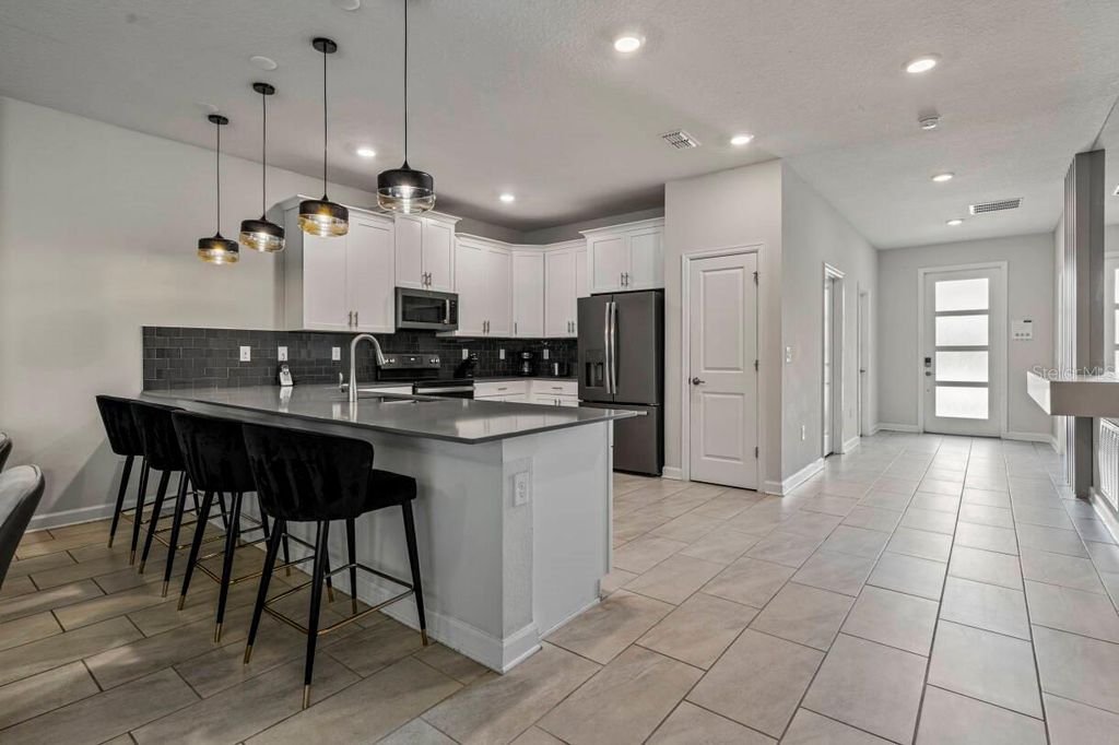 Photo of 2830 Storey Cove Avenue, Kissimmee, FL 34746 (MLS # O6353541)