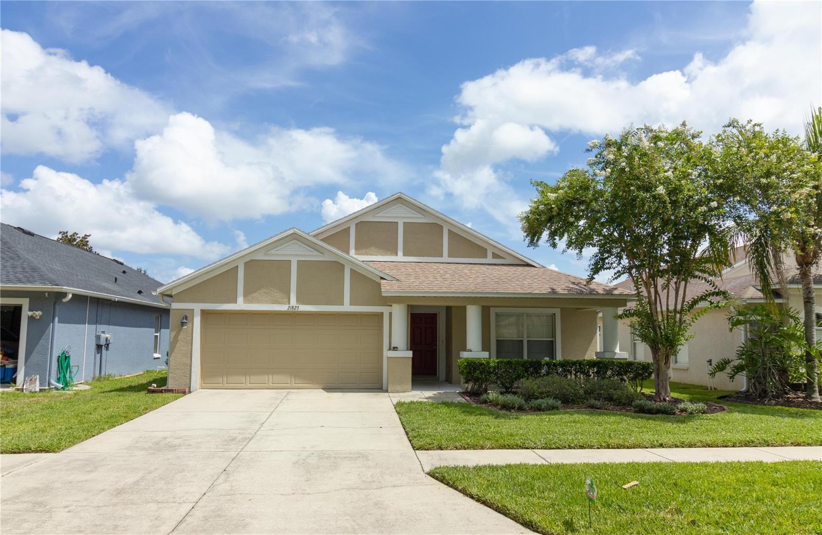 Dazzling 5 Bedroom Single Story Home nestled on a pristine pond front lot on a quiet oak canopy circle in award winning Wilderness Lake Preserve. A 2100 Sq Ft home with 5 bedrooms that happens to be single story is a very rare opportunity. At the heart of this wonderful home is its spectacular kitchen which features upgraded new stainless steel appliances, glistening quartz countertops, epic penninsula breakfast bar comfortably seats 7 and bridges into an open concept living room perfect for entertaining or everyday dining, center island, abundant cabinetry window seat and dining nook. A spacious living room with inspirational pond views opens up to a screened and covered lanai. Enchanting curb appeal with a lush landscape and a neighborly covered front porch. Great outdoor living with a large brick paver patio and a fully fenced backyard overlook beautiful pond views. Deluxe “Beachwalk” stranded bamboo engineered plank flooring with “aquaguard’ throughout the entire home. Whole house water softener. The owners suite is a tranquil oasis with pond views and glass slider access to the lanai, reading nook and includes a full ensuite complete with huge walk-in closet, separate water closet, dual upgraded vanities, garden tub and separate walk-in shower. The fifth bedroom makes a great office with elegant glass paneled French doors, front yard views and room for multiple work stations. The formal living room is a perfect place for joyous gatherings and could also be used as an expansive formal dining room. All of the bedrooms are spacious. The guest bathroom features a new and stylish vanity and a shower-tub combo. New water heater, new air conditioner, new and stylish "Tempered Gray" interior paint and upgraded lighting throughout. All of this plus Wilderness Lake Preserve's extensive and impressive amenities including an epic lake front recreation complex stylized after Walt Disney’s “Fort Wilderness”, multiple fishing docks with boats provided, world-class fitness center overlooking lake, lagoon and heated lap pools, outdoor spa, saunas, movie theater, tennis, basketball and sand-volleyball courts, multiple parks and playgrounds, planned events, nature center, party room, business center, wifi and summer camp-like programs. This amazing home is an ultra rare opportunity that will surely inspire multiple offers.