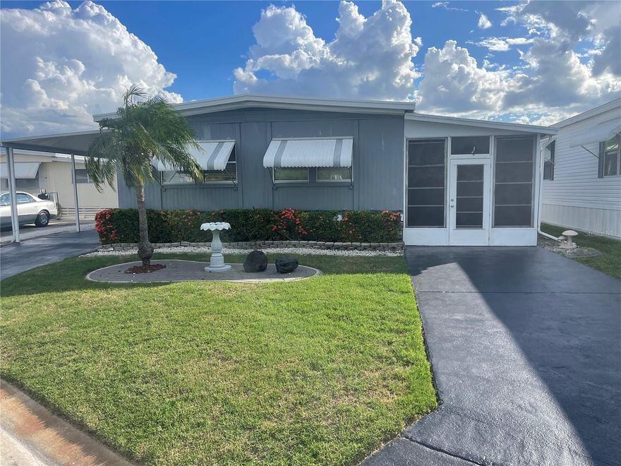 Welcome to Caribbean Isles Residential Cooperative. This home is a 3 bedroom, 2 bath home.  Very Nice Kitchen with Island Cooktop.  The Primary Bedroom has a large Walk-in Closet with an Ensuite. One Bedroom has been converted to an office. Great Screened Patio to just sit and watch the world go by. The home is low maintenance and well-maintained. Caribbean Isles Residential Cooperative is a highly desired community to live in. It is a VERY Active 55+ community. From Shuffleboard and Bocce Ball to Corn Hole and Horseshoes. We welcome Golf Carts and several times a year we gather and decorate for Parades. The Clubhouse is used for Dances, Games, Dinners and more. In the Clubhouse we have a well-stocked Library and a large Craft Room. The Game Room has 3 Billiard Tables, 2 Poker Tables, a Bar Shuffleboard with 2 Dart Boards. Don't miss this opportunity.