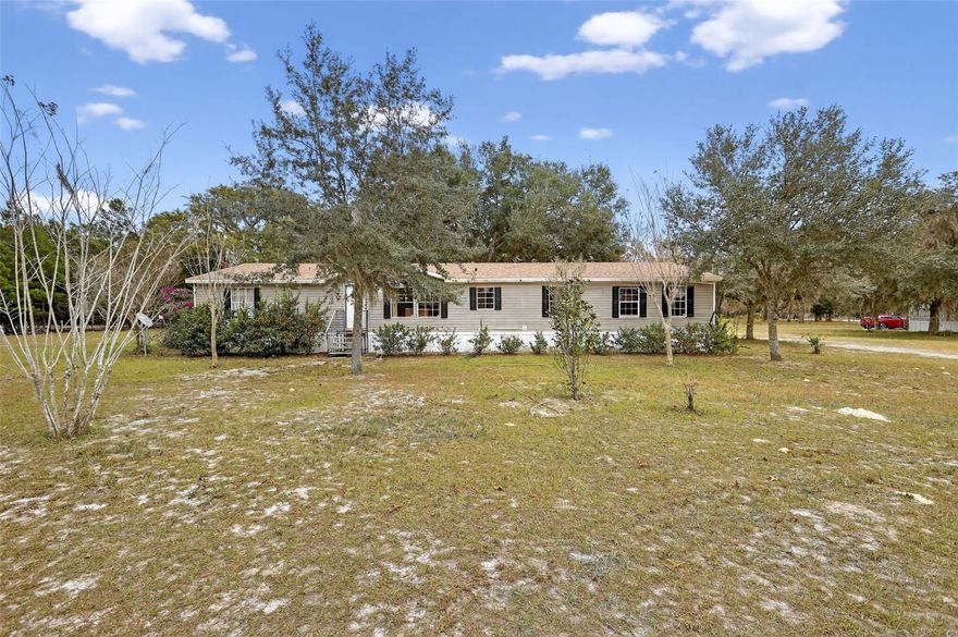 Welcome to 41929 Pine Valley Dr, Paisley, FL 32767 (formerly part of 41901 Pine Valley Dr, which was split into two parcels). This property includes the 4.28-acre parcel with the home a rare opportunity to own usable acreage with room to spread out and enjoy peaceful rural living. This well-maintained 4-bedroom, 2-bath home offers approximately 2,356 square feet and sits on beautifully cross-fenced land, ideal for animals, hobbies, or outdoor recreation. Multiple outbuildings add value and versatility, including two sheds. Recent improvements provide peace of mind, featuring a new roof and all new plumbing updated within the last 2 years. The HVAC units were installed in the last 4 years. The kitchen is equipped with stainless steel refrigerator, stove, and dishwasher will all convey. With much smaller comparables selling around $300,000, this house is priced to move quick! Enjoy privacy, space, and flexibility just a short drive from local conveniences. Whether you?re looking for a homestead, hobby farm, or private retreat, this property offers endless potential.