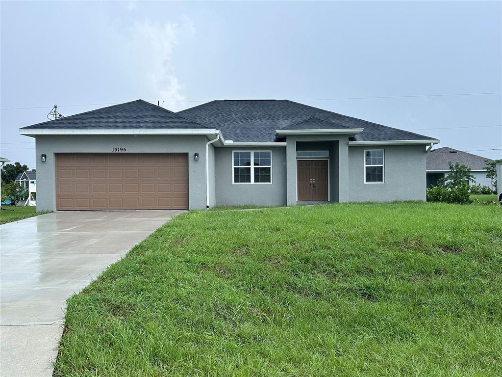 Photo of 13195 Drysdale Avenue, Port Charlotte, FL 33981 (MLS # TB8420606)