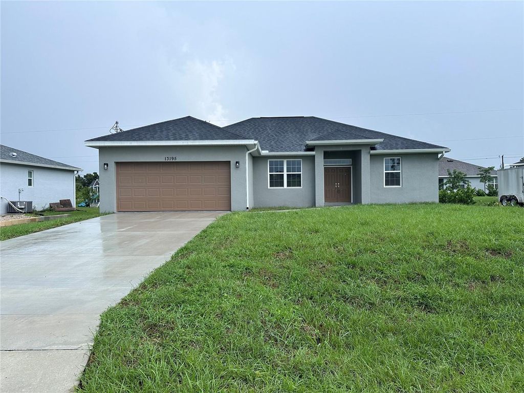 Photo of 13195 Drysdale Avenue, Port Charlotte, FL 33981 (MLS # TB8420606)