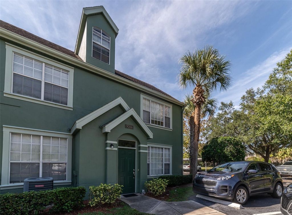 Photo of 9266 Lake Chase Island Way #9266, Tampa, FL 33626 (MLS # TB8414245)