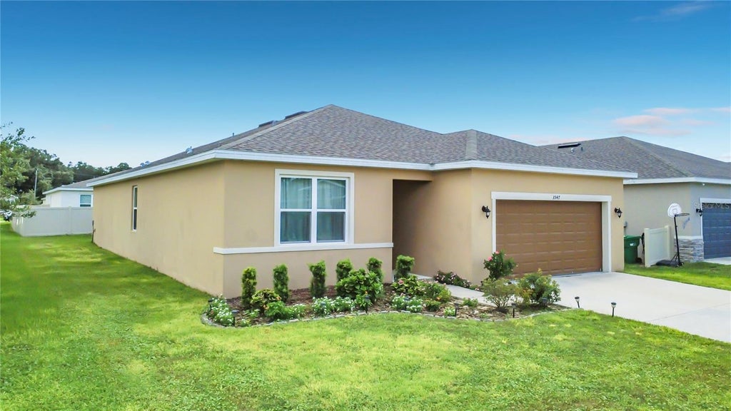 Photo of 3947 Mayhill Loop, Eustis, FL 32736 (MLS # O6434515)