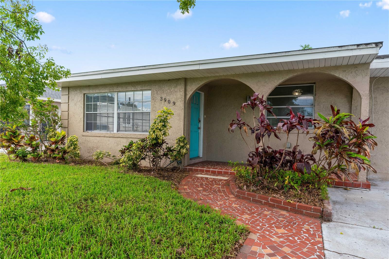 Welcome to a beautiful home nestled in the heart of Midtown! This charming 3-bedroom, 1-bath residence offers the perfect blend of modern convenience and classic Florida charm. Step inside to find a bright and open floor plan. The spacious kitchen is a standout with stainless steel appliances. The primary suite offers a peaceful retreat and generous closet space. Two additional bedrooms provide flexibility for guests, home office, or playroom needs. Outside, enjoy the fully fenced backyard—ideal for relaxing, entertaining, or letting pets roam. With a prime location in the sought-after Plant High School district, and just minutes from International Plaza, restaurants, Tampa International Airport, and major highways, this home combines comfort, style, and convenience. Whether you're a first-time buyer, looking to downsize, or seeking an investment opportunity, 3909 W Lemon St is a must-see. Schedule your showing today and make this Tampa gem your own!