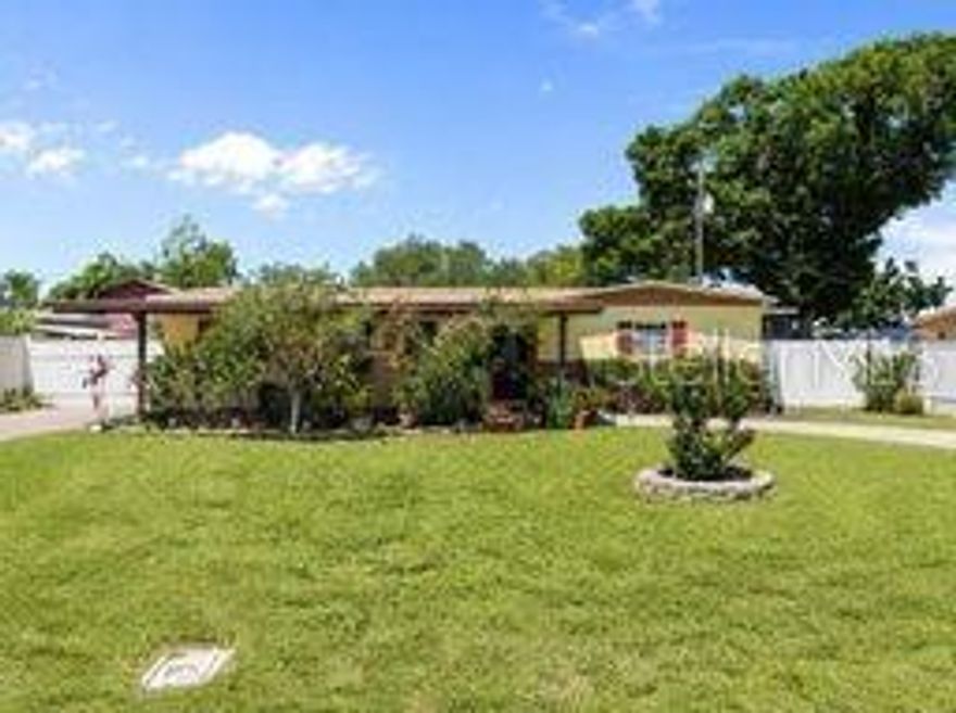 Welcome to this charming single-story home in Tampa offering comfortable living and an inviting open layout perfect for everyday life and entertaining. The spacious living area flows seamlessly to the back patio, creating an ideal indoor-outdoor living experience. The kitchen features a cozy eat-in dining space, providing the perfect spot for casual meals and gatherings. Step outside to enjoy the covered screened-in porch — a relaxing retreat for morning coffee, evening unwinding, or enjoying Florida living year-round. Discounted rate options and no lender fee future refinancing may be available for qualified buyers of this home.