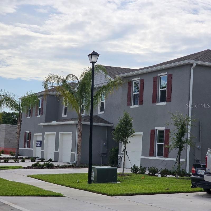 Experience effortless Florida living in this beautifully designed 3-bedroom, 2.5-bath townhome located in the sought-after Rivers Edge community. BRAND new build, this home offers a sleek, modern aesthetic and a thoughtfully designed open-concept layout. The main floor features a spacious family room, contemporary kitchen, and dining area—perfect for everyday living and entertaining.
Upstairs, you’ll find three generously sized bedrooms, including a luxurious primary suite complete with a walk-in closet and private ensuite bath. Smart home technology is seamlessly integrated, providing added comfort and convenience. Enjoy quiet mornings or evening gatherings on your private outdoor patio.
Situated in Edgewater with easy access to shopping, dining, and recreational amenities, this home is ideal for those seeking a relaxed lifestyle with modern conveniences.