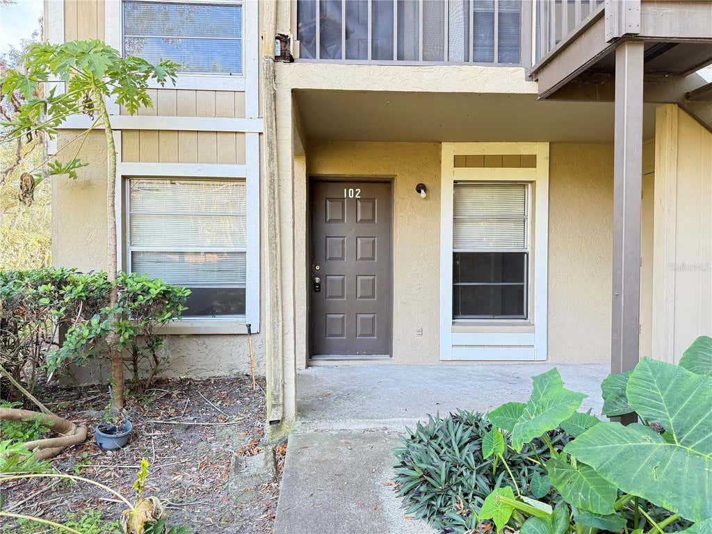 Photo of 14308 Hanging Moss Circle #102, Tampa, FL 33613 (MLS # TB8530233)