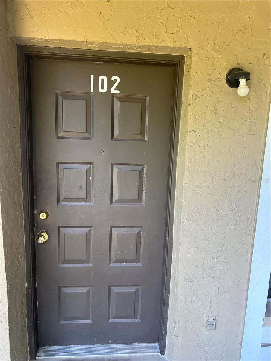 Photo of 14308 Hanging Moss Circle #102, Tampa, FL 33613 (MLS # TB8530233)