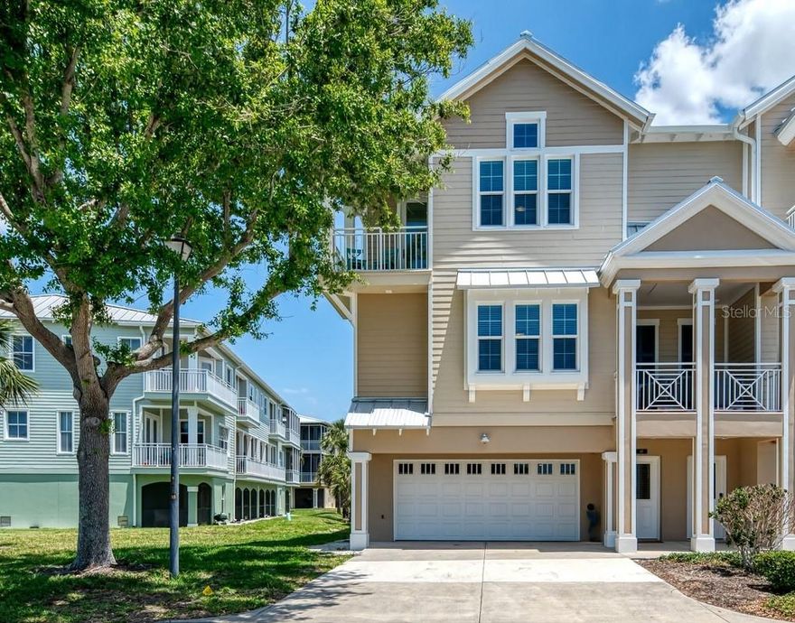 Immerse yourself in the epitome of Florida Beach Life Living! The Landings at Coral Creek is an intimate gated community, comprising 132, alluring three story townhomes surrounded by mature landscape and 40 acres of tropical foliage. This End Unit, 4-bedroom, 3-bathroom gem is a sanctuary of luxury and convenience, situated along Coral Creek, prime location for beach and boating enthusiasts, less than two miles away from the Boca Grande Causeway and Gasparilla Island. As you step inside this exquisite property, you'll immediately feel welcomed by the natural light and spectacular views. NEW Luxury vinyl plank flooring extending throughout. Some of the notable interior features include private elevator from the garage to the 3rd floor, high coffered ceilings, recessed lighting, ceiling fans, complete interior painting in 2024, in addition, this home features New Hurricane Impact Windows and Doors in 2023, offering you both peace of mind and enhanced energy efficiency.The kitchen is a chef's delight, complete with 42-inch cabinets, elegant granite countertops, stainless steel appliances with a double oven, seamlessly opening to the great room and dining room to create an inviting area for both cooking and entertaining. Kitchen Renovation was completed in 2024. Step out onto the covered screened balcony just beyond the dining room where you can savor a morning cup of coffee while watching the sunrise over the creek. Located on the first living level is the first of three guest bedrooms, complete with a coffered ceiling, walk-in closet and adjacent full bathroom. The large master bedroom features a private screened balcony that overlooks the conservation area leading to Coral Creek. The ensuite master bathroom is a spa-like retreat with a spacious vanity with 2 sinks, an elegant glass enclosed shower with built-in bench and a generous walk-in closet. Bathroom renovation completed in 2023. For those who love the outdoors, a full light door opens directly to your private screened balcony overlooking your Tropical oasis providing a quiet place for relaxation. There are two more spacious guest bedrooms with walk-in closets, connected by a Jack and Jill bathroom, creating a comfortable space for all your visitors. Guests can enjoy amazing sunsets from their own open air balcony overlooking Placida Harbor. Let's not forget about the all important 4-car tandem garage with a work bench and storage cabinets. Plenty of room to house jetskis, collector cars or even a small boat! Off the back of the garage you will find a covered screened patio, perfect for enjoying the breeze. The exterior of the buildings were recently painted, including the lanai and patio floors, New Lanai Screens on all 3 covered balconies, a New Metal Roof and Gutters were installed in 2024. This charming community is surrounded by the natural beauty of mature trees, ensuring a tranquil and serene environment. Community amenities include a Clubhouse for social gatherings and activities, comfortable sitting areas complete with a double sided fireplace extending to the outdoor covered seating area, fully outfitted kitchen, resort style pool and hot tub, tennis and pickleball courts, a fitness center, community dock to launch your kayak or fishing and a cozy library. Conveniently situated minutes away from multiple marinas, golf courses, public beaches, exquisite dining and a Publix grocery store. Make your Florida Dream a Reality. Schedule your showing today!