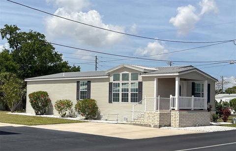 Photo of 7316 Americana Drive NE #146, St Petersburg, FL 33702 (MLS # TB8471847)