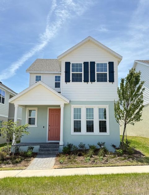 Photo of 498 Winsome Alley, Groveland, FL 34736 (MLS # O6404390)