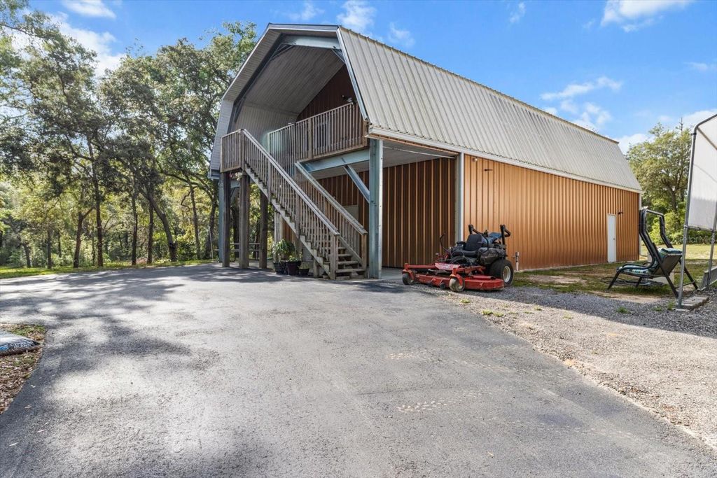 Photo of 7059 N Lecanto Highway, Hernando, FL 34442 (MLS # OM701358)