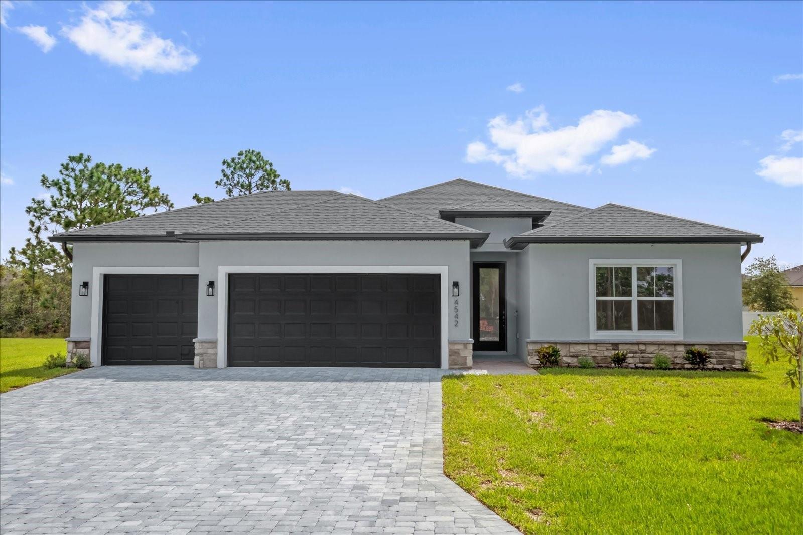 Under Construction. Brand New, Upgraded 4-Bedroom Home in Sugarmill Woods Cypress Village!
Welcome to this brand new, beautifully built home in the highly sought-after Sugarmill Woods! Featuring 4 spacious bedrooms, 3 full bathrooms, and a 3-car garage, this home offers modern living at its finest, with high-end upgrades and thoughtful design throughout. Step inside to a bright, open-concept layout with spacious ceilings, luxury vinyl plank flooring, and designer finishes. The chef-inspired kitchen boasts solid surface countertops, stainless steel appliances, custom cabinetry, and a large center island—perfect for entertaining and everyday living. The owner’s suite is a true retreat with a spa-like en-suite bath, complete with dual vanities, a walk-in shower, and a spacious dual walk-in closets. Three additional bedrooms and two full guest bathrooms provide plenty of room for family, visitors, or a home office. Enjoy the convenience of a 3-car garage, modern fixtures, energy-efficient features, and plenty of storage. Outside, a covered patio invites you to relax and enjoy the Florida lifestyle. Located in the vibrant Sugarmill Woods community, you’ll have access to top-rated golf courses, parks, walking trails, and more. This turnkey new construction is already under construction—don’t miss your chance to make it yours!