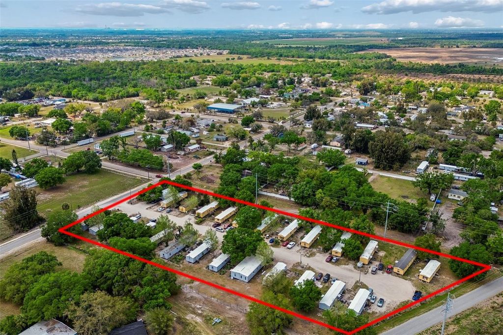 Photo of 610 Railroad Street, Wimauma, FL 33598 (MLS # OM721758)