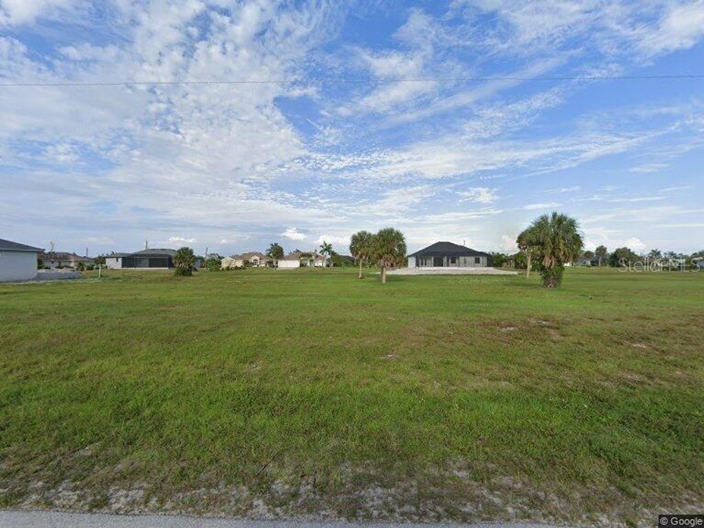 Photo of 197 Rotonda Boulevard S, Rotonda West, FL 33947 (MLS # A4660687)