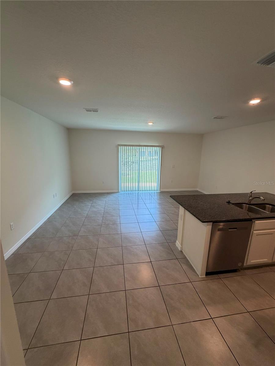 Photo of 1512 Lumber Avenue, Davenport, FL 33837 (MLS # O6435029)