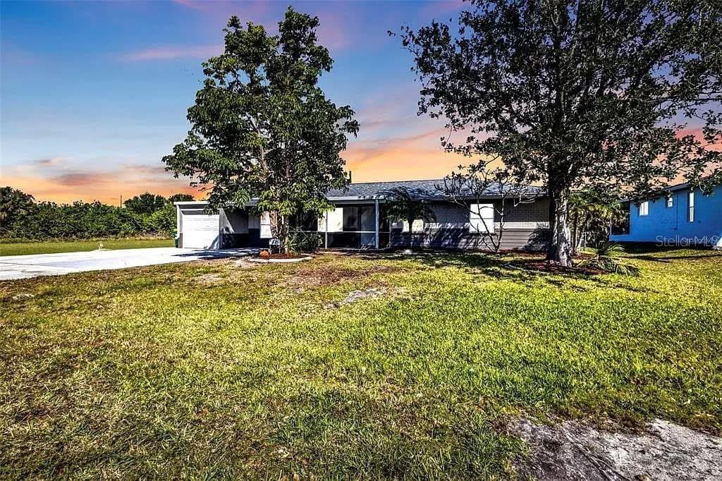 Welcome home to this charming property in the heart of Punta Gorda! This 3 bedroom, 2 bath, 1 car garage home is located on a quiet street, just minutes from downtown Punta Gorda. The home is located in the community of Charlotte Park. Optional HOA fee which has access to what this area has including beaches, boats, and sports. This beautiful home comes furnished with tile and luxury vinyl throughout. The backyard is a haven for both your pets and little ones, thanks to the fully fenced yard, offering peace of mind while you soak in the serene sunsets in the evenings. The heart of this home is the kitchen, featuring stone countertops, gorgeous cabinets and stainless-steel appliances. Whether you're a culinary enthusiast or prefer quick and easy meal prep, this kitchen has you covered! The dining room, with its French doors, opens up to a 25x7 screened lanai/ Florida room, providing an ideal spot for a simple dining experience or simply enjoying your morning coffee with the soothing sounds of the birds. Right off the kitchen is a generously sized laundry and storage room, adding convenience and versatility to the home's layout. BONUS: The property has an oversized parking pad & driveway. It measures approx. 54X12, large enough for your boat or RV. (Check with county regulations) The roof, Ac, HVAC unit & electrical panel are newer for peace of mind. Come live the Florida lifestyle today!