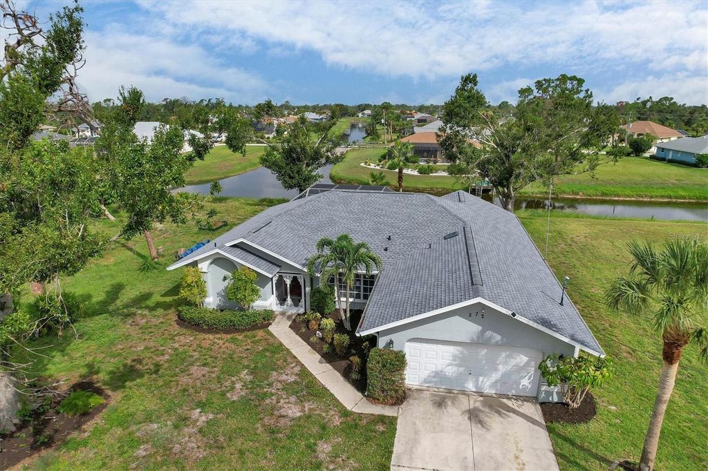 Photo of 272 Broadmoor Lane, Rotonda West, FL 33947 (MLS # D6141842)