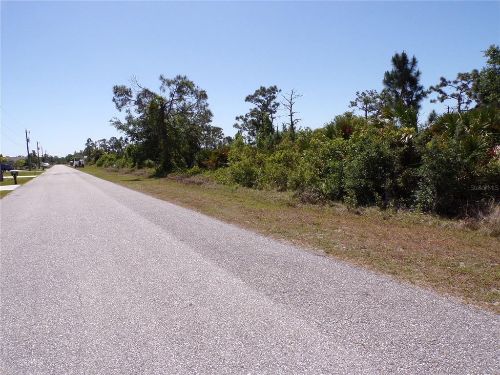 Photo of 13465 Boatbill Lane, Port Charlotte, FL 33981 (MLS # C7508427)