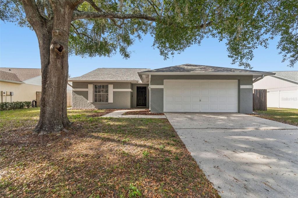 Photo of 1615 Cobbler Drive, Lutz, FL 33559 (MLS # TB8463419)