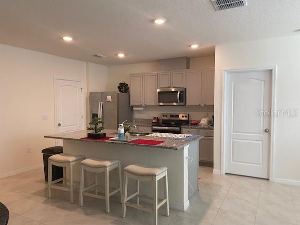 Photo of 11370 Amber Ridge Drive, Zellwood, FL 32798 (MLS # S5150538)
