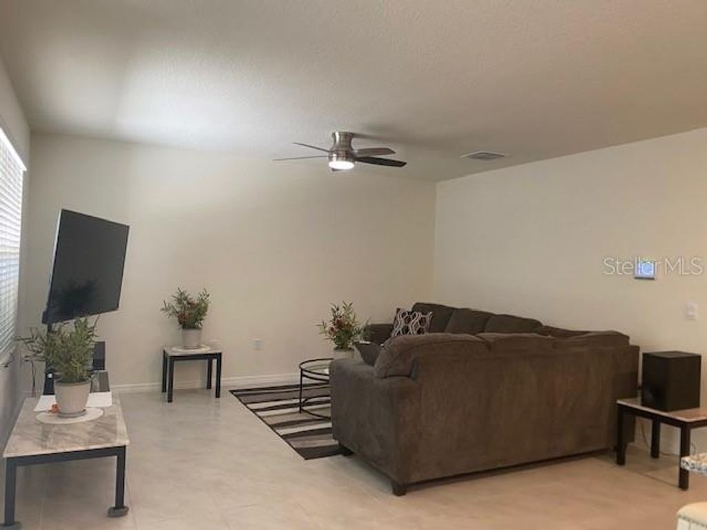 Photo of 11370 Amber Ridge Drive, Zellwood, FL 32798 (MLS # S5150538)