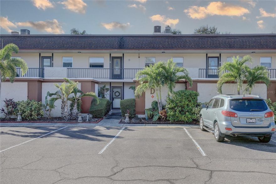 Check out this FIRST FLOOR condo in the desirable 55+ community of Bay Palms with one of the LOWEST HOA fees in Pinellas county!   Are you looking for the perfect HIGH & DRY location? This is it!  For peace of mind, this condo is in a NON FLOOD ZONE. This is a 1 bedroom/1 bathroom condo that feels much larger than the square footage.  As you open the front door, you will be greeted by a SPACIOUS Dining room/Living room area with views to the outside patio.  The beautiful kitchen was UPDATED IN 2022 with SOFT CLOSE solid wood cabinets, PULL OUT drawers, BAMBOO countertops, STAINLESS STEEL appliances including a Viking dishwasher, and a large closet PANTRY. The bathroom has been UPDATED with a gorgeous WALK-IN Shower.  There is a very spacious LINEN CLOSET in the hallway for extra storage.  The bedroom can easily accommodate a KING SIZE bed suite and has a WALK-IN CLOSET.  There are sliding glass doors in the Living Room that lead to a screened in porch. You will LOVE the OPEN pavered patio that will make you feel like you are on vacation every day. Enjoy the fresh air and Florida sunshine with your morning coffee or RELAX after a day at the heated pool or beach. The outdoor terrace is exclusive to first-floor units and allows you to create your own private oasis, perfect for container gardening, reading a book, or gathering with neighbors for friendly conversations. This condo also offers a NEW Ista-hot water system installed in 2023; ceramic tile throughout for easy cleaning; a dedicated parking spot directly in front of the unit;  and a large storage closet directly across from your front door that is great for your beach chairs, coolers, bikes, and holiday décor; and the Laundry room is ONLY 2 doors away.  This condo makes the perfect Florida vacation retreat or stay and enjoy all year.  As part of the community, residents can enjoy fantastic amenities such as a HEATED POOL, a lively shuffleboard court, a clubhouse and grill for gatherings, and plenty of visitor parking spaces. The LOW HOA monthly fee of $360 includes Cable TV, heated pool, clubhouse, shuffleboard, water, sewer, building insurance, trash service, lawn service, exterior maintenance, parking and escrow reserves. The Land Lease Fee is included in the Monthly HOA Fee. For added convenience and a stress free transition, this unit can be sold furnished (with the exception of a few items) or unfurnished.  The community is quiet and has a private walking gate on the West side of the property bringing you to a grocery store and a full retail center.  Bay Palms offers a FRIENDLY and welcoming community, but also maintains a few key policies: no pets, a 55+ age restriction, and rentals permitted after one year of ownership (with a 3-month minimum lease term).  It is a short drive to the award-winning Gulf Beaches and a 30 minute drive to Tampa, where you can enjoy professional sporting events, tourist attractions, and a quick trip to the airport.  Are you ready to embrace a PEACEFUL and CONVENIENT lifestyle of MAINTENANCE FREE and COASTAL living?  Don’t miss this opportunity for your own AFFORDABLE piece of PARADISE! Schedule your private showing today – this is the ONLY available unit!