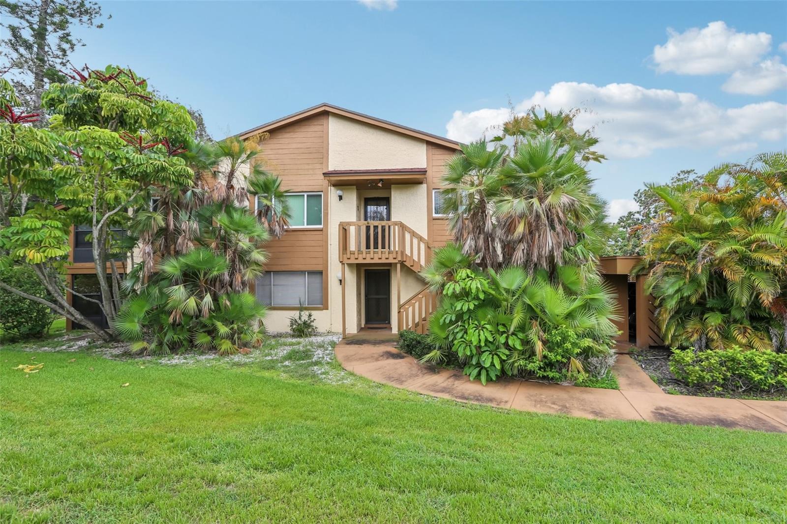 BEST PRICED CONDO IN BEACON LAKES – 55+ MAINTENANCE-FREE COMMUNITY – PRIME LOCATION
Don’t miss this opportunity to enjoy Florida living at its best—whether you're looking for a seasonal retreat or full-time residence. This well-maintained, light-filled, ground-floor condo offers 2 bedrooms, 2 baths, and 1,144 sq. ft. of living space in a serene, tropical setting.
Inside, you'll find a split floor plan designed for privacy and functionality. The spacious living and dining area opens to the back lanai through sliding glass doors, creating a bright and airy gathering space.
The kitchen features ceramic tile floors, tile backsplash, a closet pantry, and a full-size laundry closet with washer and dryer included. Sliding glass doors lead to your private front lanai, perfect for morning coffee or afternoon relaxation.
The primary bedroom is tucked in the rear of the condo and includes a large walk-in closet and an en-suite bath with a walk-in shower. The second bedroom is located near the hall bath, making it ideal for guests.
An additional flexible room with a large storage closet can be used as a sitting area, office, dining room, or hobby space—the choice is yours!
Enjoy two private lanais, a covered carport, and an outdoor storage closet for added convenience.
Beacon Lakes is a highly desirable 55+ community offering a clubhouse, heated pool and spa, bocce ball, shuffleboard courts, fitness center, library, pool table, and a variety of clubs and social activities—all included in the low HOA dues.
HOA covers: water, trash, roof, cable TV, internet, exterior maintenance, and all amenities.
?? Close to beaches, golf courses, parks, shopping, dining, and more—this is the perfect Florida retreat!
?? Note: No pets allowed, except service or emotional support animals with proper documentation and HOA approval.