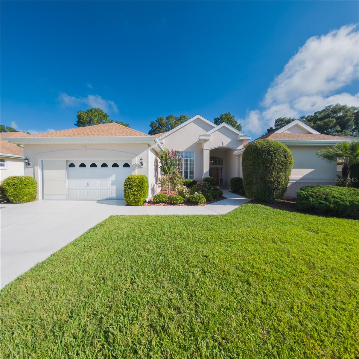 *Situated on the 10th fairway of the ROYAL OAKS GOLF COURSE, this impressive Palm Beach floor plan offers 2,527 sq. ft. of living space under air with a roof replaced in December 2021. Boasting 3 bedrooms, 2 baths, and a generous 2-car garage, this home combines style, comfort, and breathtaking Royal Oaks golf course views.
**The chef’s kitchen features abundant cabinetry, a large walk-in pantry, center island, and solid-surface countertops. The refrigerator has reverse osmosis system for water and ice. Its open-concept design flows seamlessly into the living room and den, while a split-bedroom layout ensures privacy. You’ll also enjoy a formal dining room and a versatile bonus space.
***The primary suite is a private retreat with an expansive walk-in closet and a spa-inspired bath featuring a garden tub and oversized walk-in shower. Relax year-round in the enclosed lanai or step onto the patio to bask in the Florida sunshine and take in the golf course scenery. An extra-large indoor laundry room—with its own additional refrigerator and ample storage—adds everyday convenience.
****Enjoy 6 sparkling pools, 5 relaxing spas, 2 fully equipped fitness centers, and a wide range of recreational activities including pickleball, shuffleboard, tennis, horseshoes, and more.
Challenge friends in the card room, unleash your creativity in the ceramic studio, shoot a game of pool in the billiard room, or unwind with a good book from the library by the poolside.
Bring your furry friends to Thatcher Dog Park, perfect your swing at the Driving Range, or head straight to the 18-hole golf course. Afterward, grab a bite and relax at the Oak Room Bar & Grill.
With so much to do, boredom isn't an option—this is the lifestyle you've been waiting for!