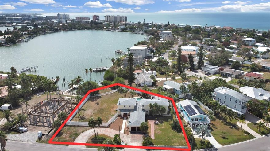 DEMOLITION OF EXISTING STRUCTURE SCHEDULED!! NEW CONSTRUCTION WATERFRONT OPPORTUNITY — DOUBLE LOT! New survey will be completed after demo! Property Sold As-Is at Land Value Lot Size: 123' x 189' | Over 30,000 sq. ft. Attention builders, developers, and dream-home visionaries — this is a rare double-lot opportunity to create a custom new-construction waterfront estate in the heart of Redington Beach! With over 30,000 square feet of prime property, this site provides limitless design potential — from a sprawling single estate with multiple outdoor living areas and a resort-style pool, to a luxury multi-structure compound or dual-home development (subject to zoning). Enjoy direct Intracoastal access- bring the boats, jet skis, and paddleboards — plus easy access to the Gulf of Mexico and the vibrant boating destinations of John’s Pass and Clearwater Beach. Situated in prestigious Redington Beach, residents enjoy the private beach access and resident-only parking No HOA or deed restrictions — full creative freedom for your build! Walking distance to the beach, and dining, and entertainment all close by. Whether you’re an investor seeking a rare waterfront development parcel or a homeowner ready to build a custom coastal masterpiece, this property delivers unmatched size, access, and potential. Don’t miss your chance to build new on one of the largest waterfront lots in Redington Beach — opportunities like this are nearly impossible to find!