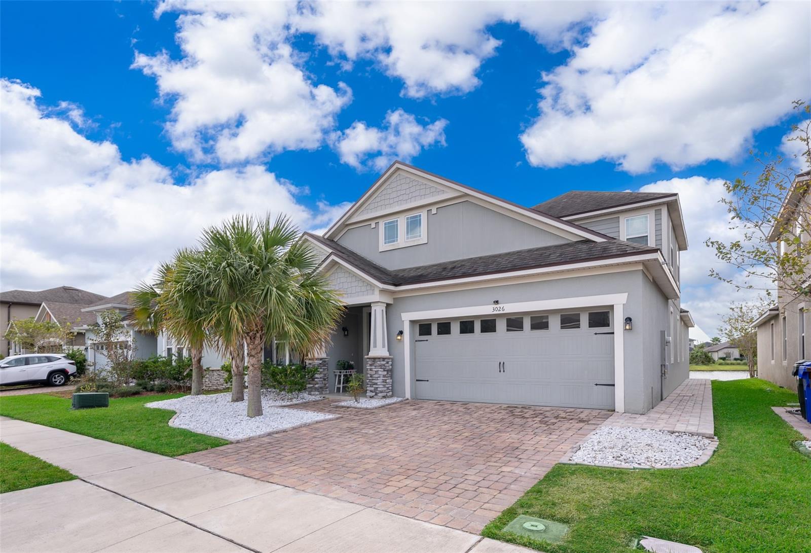 Live in luxury in this spectacular 5-bedroom, 4.5-bath rental home, located in one of Kissimmee’s most desirable gated communities with 24-hour security and resort-style amenities. Built in 2017, this elegant home offers beautiful custom landscaping, an open paver patio, and peaceful pond views.
Inside, you’ll find a private office with French doors, a stylish half bath, and an open-concept living area. The gourmet kitchen features a large granite island, stainless steel appliances, and plenty of storage space. The spacious master suite offers a spa-like bathroom with a large shower, freestanding tub, dual vanities, private toilet room, and walk-in closet.
Four additional bedrooms are located on the main floor—one with its own private bathroom—while upstairs, a versatile loft and a fifth bedroom with a full bath provide extra space for guests or family.
Enjoy the beautifully landscaped backyard with pavers and serene lake views—perfect for relaxing or entertaining.
As a resident, you’ll have access to amazing community amenities: a modern fitness center, resort-style pool with splash zone, playground, fire pit area, jogging trails, basketball court, and more.
Don’t miss this opportunity to rent an exceptional home in a vibrant, secure community!