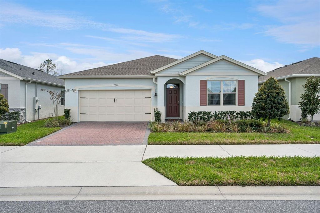 Photo of 17750 Blazing Star Circle, Clermont, FL 34714 (MLS # O6388882)