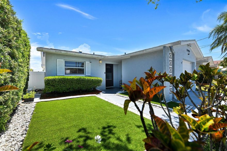 Check out this spectacular waterfront opportunity in the highly desirable Gulf Harbors community! This beautifully maintained 2-bedroom, 1-bathroom home with a 1-car garage features updated tile flooring and a modernized kitchen, offering a clean and move-in-ready feel. Natural light pours in throughout the home, showcasing stunning water views from nearly every room—creating a relaxing coastal atmosphere you’ll enjoy every day.  Step outside to your private backyard patio and take in 40 feet of serene waterfront living. The floating dock is perfect for boating, kayaking, paddleboarding, or simply enjoying the Florida lifestyle right from your backyard.  Located in a golf cart-friendly neighborhood, Gulf Harbors offers optional amenities including access to a private beach for just $200/year—complete with cabanas, grills, and lounging areas. An additional optional HOA of $120/year provides access to community boat ramps, clubhouses, and more.  Conveniently situated just minutes from shopping, dining, hospitals, and major routes US-19, you’re perfectly positioned for easy access to Clearwater, St. Petersburg, and beyond. Tampa International Airport is approximately 45 minutes away, and vibrant downtown New Port Richey is just a short drive, offering parks, restaurants, breweries, coffee shops, and entertainment.  Don’t miss your chance to own a piece of waterfront paradise, schedule your showing today before it’s gone!