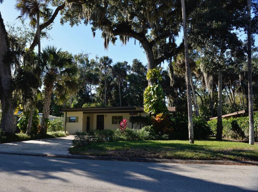 This gorgeous 2 bedroom, 2 bath home is a slice of tropical paradise. You feel it as soon as you walk in. Presenting nicely with new HVAC, new duct work, and updated appliances. Roof is less than 5 years old. Both bathrooms have been updated to include new sinks, new water closets, and fresh new wall coverings. A beautiful and large enclosed Florida Room really showcases the natural greenery around the property. The yard has a wood deck and sprinkler system as well.  The location of this property also has the convenience factor, as the walkway to the Heated Pool and Tennis Courts are nearby. Additionally, the boat launch is located on the same street. Edgewater Landing is an award winning ACTIVE COMMUNITY. Bonuses include that you may store a boat or RV (when there is room) at no charge. The HOA includes Spectrum cable, Wifi, and Internet. Amenities also include a fitness room, pool tables, screened in hot tub, access to the Intracoastal fishing pier, dance floor, bingo, and ceramics classes. Live where you play. ;Water: City