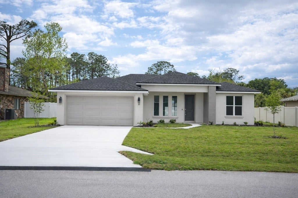 Photo of 13 Farnum Lane, Palm Coast, FL 32137 (MLS # FC319589)