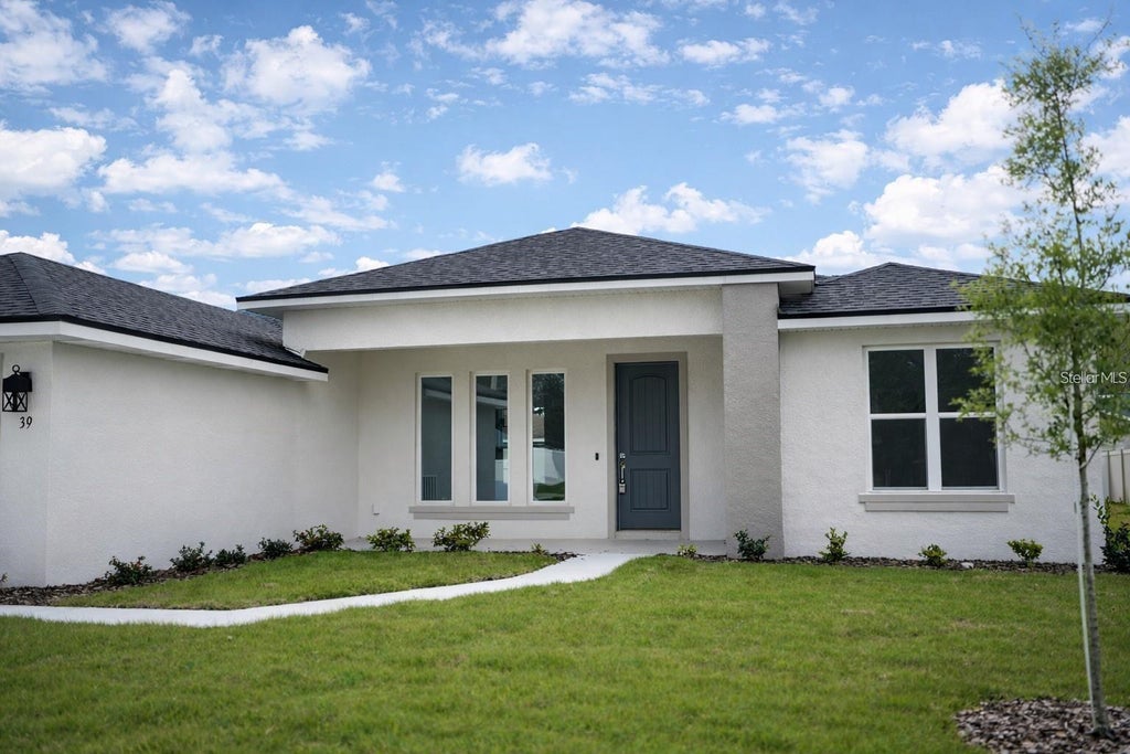 Photo of 13 Farnum Lane, Palm Coast, FL 32137 (MLS # FC319589)