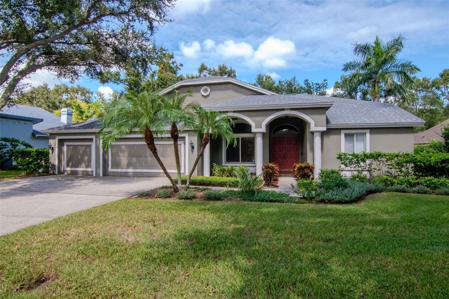 One or more photo(s) has been virtually staged. Welcome to this spacious 4-bedroom, 2.5-bath pool home with a 3-car garage, ideally located in the sought-after Homestead Oaks neighborhood. Homes in this neighborhood rarely come on the market and when they do they sell fast. Situated in Clearwater, right on the border of Safety Harbor, this home is in a non-flood zone, offering peace of mind and convenience. With 2,412 sq. ft. of living space, there’s room to roam both inside and out. Enjoy entertaining family and friends poolside and have a cookout while watching your favorite show or sports on the outdoor TV. This home offers a formal living room and a formal dining room with an extra eat-in area off of the kitchen. Split-plan layout offers a guest bedroom, Primary bedroom and a guest bathroom with an entrance to the pool area. The updated bathrooms, indoor laundry (washer and dryer included), and wood-burning fireplace add comfort and functionality. The kitchen features stainless steel appliances with tons of cabinet space and a bar area for extra seating. The master bath includes a double-sink vanity, garden tub, separate shower, and walk-in closets. New A/C in 2025 and Roof replaced in 2013. Outdoor bar area with built-in grill and refrigerator. Located on a quiet dead-end street and centrally located near all of your shopping needs and top-rated schools. A short bike ride to downtown Safety Harbor where all the fun happens! Under a 30-minute drive to some of Florida's most popular beaches and dining. Easy access to major roads for a quick commute to Tampa Airport, St. Pete/Clearwater Airport and downtown Safety Harbor. Whether you’re looking to entertain or unwind, this home has it all.