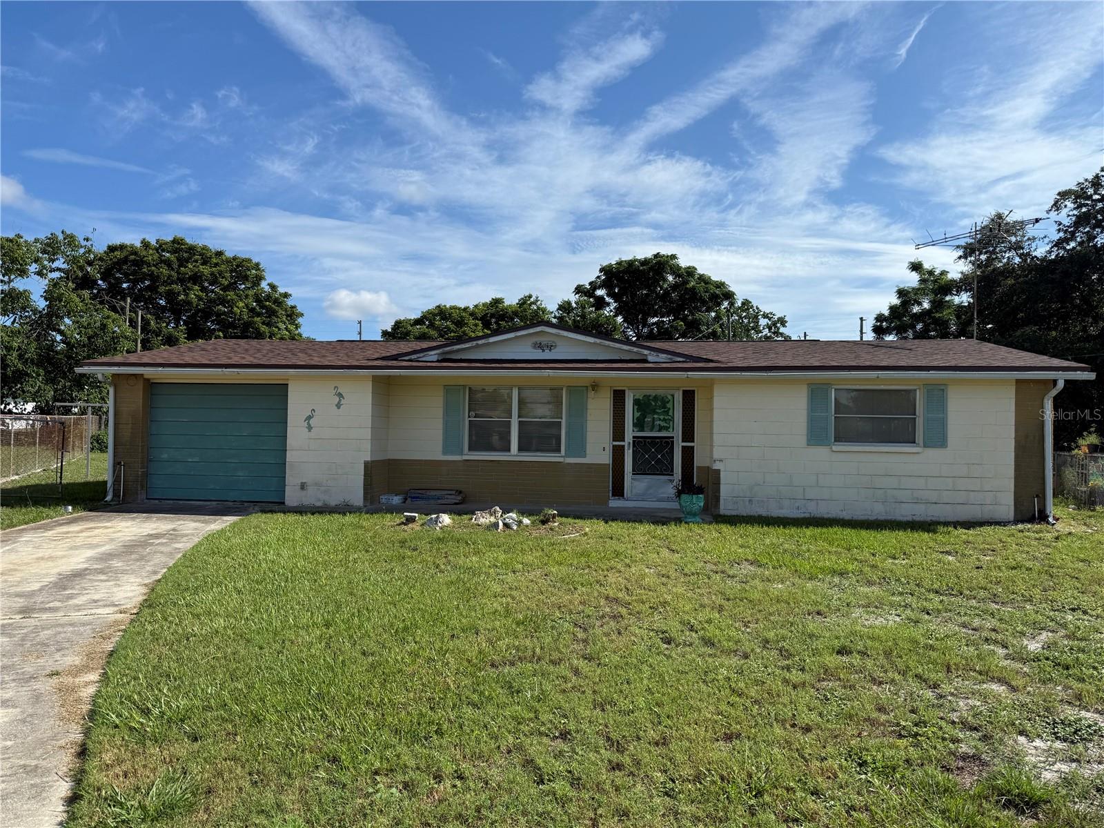 INVESTOR SPECIAL!!! UNREPAIRED SINKHOLE PROPER5TY TWO BEDROOM 1.5 BATH LARGE 432 SQ FT GARAGE PORCH FENCED YARD QUIET LOCATION NEEDS LOTS OF TLC HAS NEW ROOF 2024 NEEDS FLOORING BUT HAS TERRAZO FLOORS THRUOUT DRYWALL REPAIR AND NEEDS NEW AC GREAT ACCESS TO US 19 JUST NORTH OF SUPER WALMART!!! REALTOR HAS ORIGINAL ENGINEERS SINKHOLE REPORT