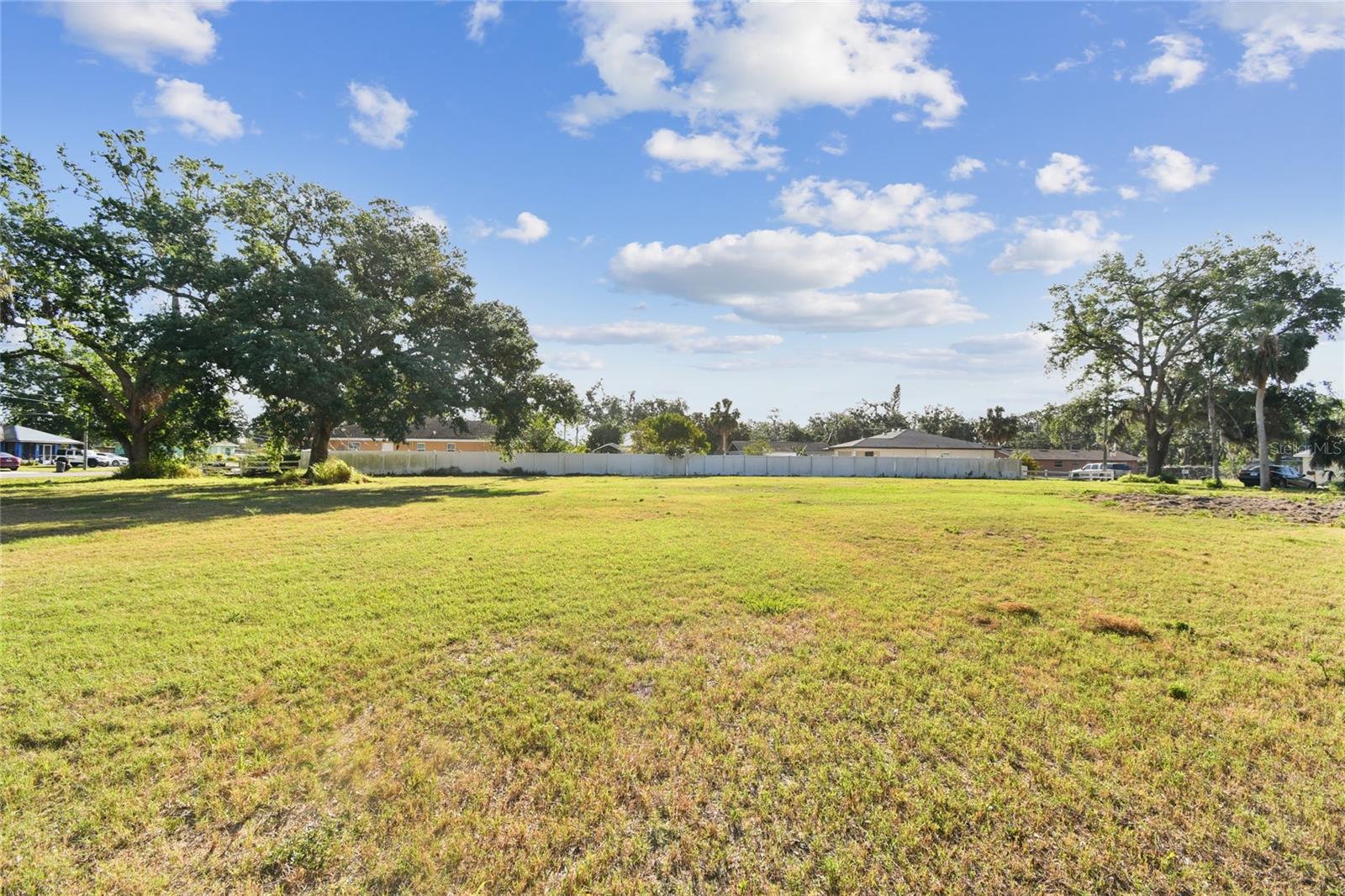 Excellent Potential to build 4 homes possible subdivide . Property has frontage on both sides adjacent streets .