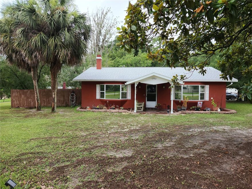Welcome to this beautiful home in Ocala Estates located just minutes from the new World Equestrian Center. This home is centrally located close to State Road 40, I75, and Dunnellon. Ocala International Airport is just seven miles away! The home features 3 bedrooms, 2 bathrooms, a Fireplace, a Florida room, 2 car garage, and a mother-in-law-suite with a full kitchen. It has a new Roof, Well, and Water Heater. This property sits on .70 acres on a corner lot, the property is completely fenced. The home is 18 miles from the crystal-clear Rainbow River. This is a significant draw for individuals who enjoy water activities and outdoor recreation. Call today to set up your private showing.