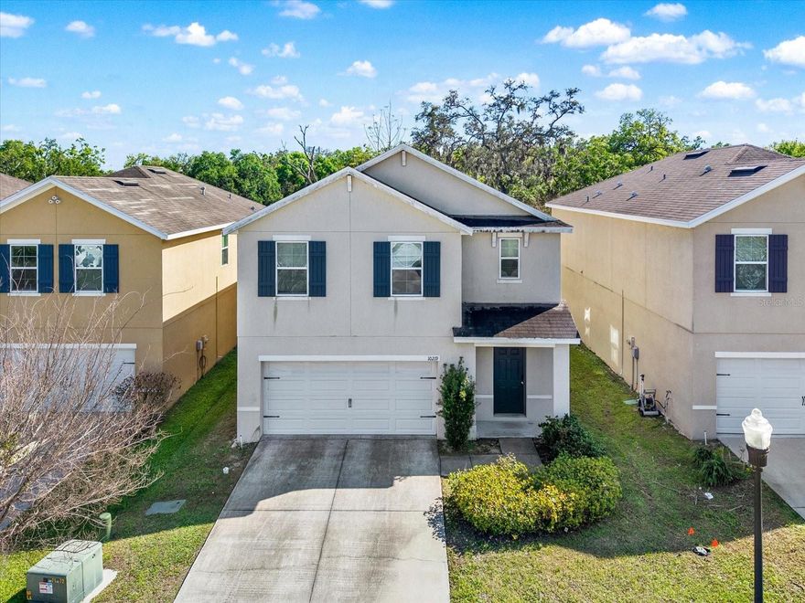 One or more photo(s) has been virtually staged. INVESTOR ALERT!  Discover the ultimate "buy and hold" addition to your portfolio at 10219 Hawk Storm Ave, Tampa, FL 33610. This rare, turn-key opportunity features a spacious 5-bedroom, 3-bathroom layout—ideal for maximizing rents in the high-demand Hawks Landing community.
Investment Highlights:
Instant Cash Flow: Fully occupied with longstanding tenants already in place, ensuring immediate returns from day one without the hassle of vacancy or leasing.
Prime Employment Hub: Situated steps aways from the Citi Bank campus, making it a magnet for professional tenants and ensuring long-term desirability.
Peaceful Setting: Tucked away on a quiet cul-de-sac street, providing a serene environment for residents while remaining minutes from major arteries like I-4 and I-75.
Modern Build: Built in 2017, this contemporary two-story home offers over 2,500 sq. ft. of living space with an open-concept kitchen, large center island, and a private master suite.
Low Overhead: Located in a community with no CDD fees and low HOA dues, keeping your monthly carry costs minimal.
Don’t miss out on this "set it and forget it" asset in one of Tampa's most convenient corridors!