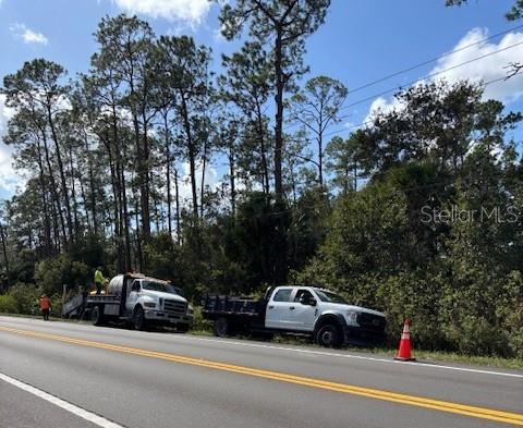 .8 Acres of vacant residential land with 334' frontage on SR 415. Located just west of Lake Ashby in New Smyrna Beach.