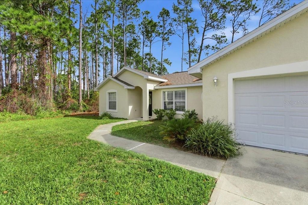 Photo of 99 Rickenbacker Drive, Palm Coast, FL 32164 (MLS # FC314423)